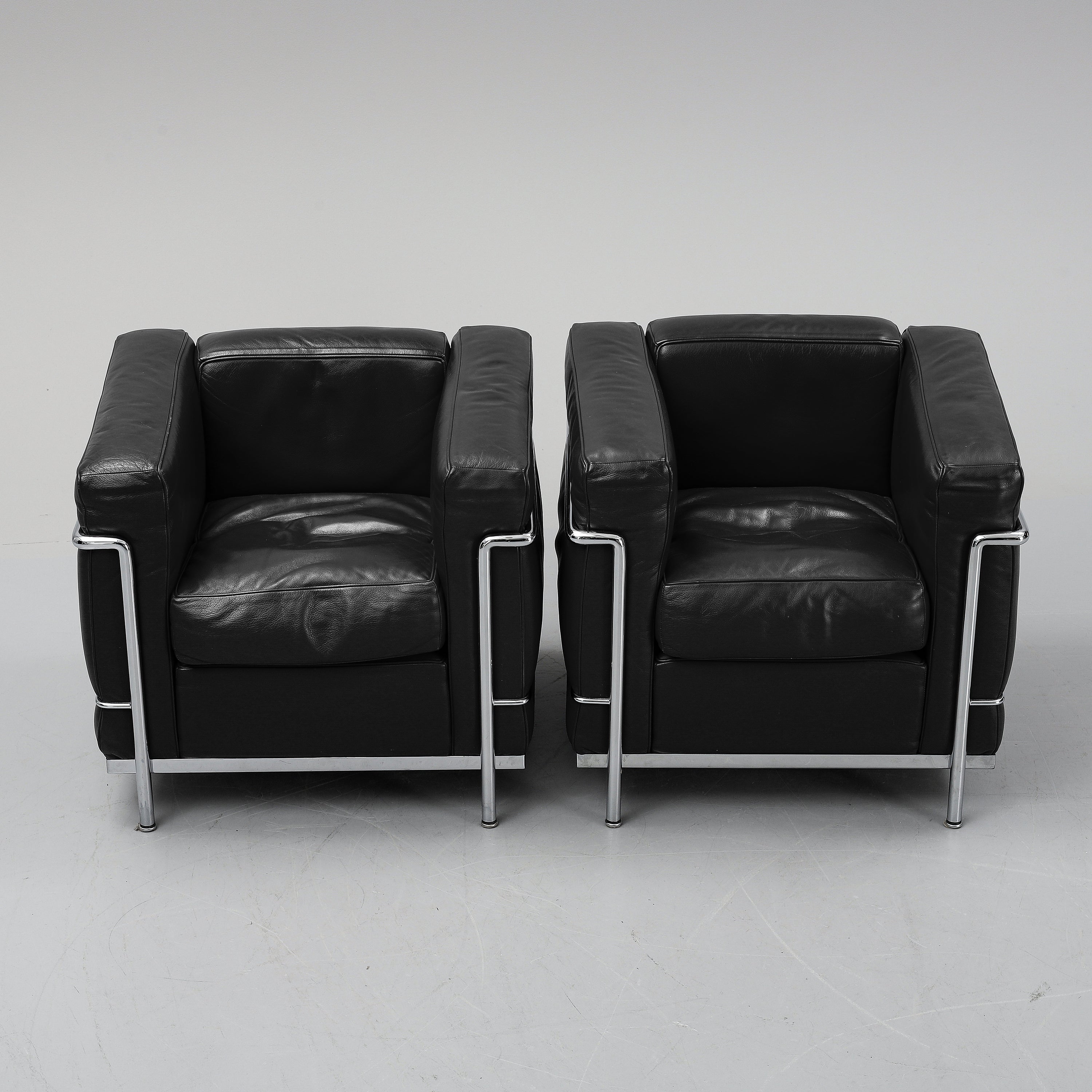 Pair of LC2 “Petit Confort” Armchairs by Le Corbusier, Pierre Jeanneret and Charlotte Perriand for Cassina